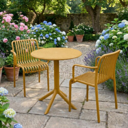 Bergen Bistro Table Saffron With 2 Alma Armchair Saffron Set picture 01 a garden lifestyle image