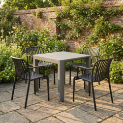 Henrik 100 Dining Table Nickel Grey With 4 Alma Armchair Black Set picture 01 a garden lifestyle image