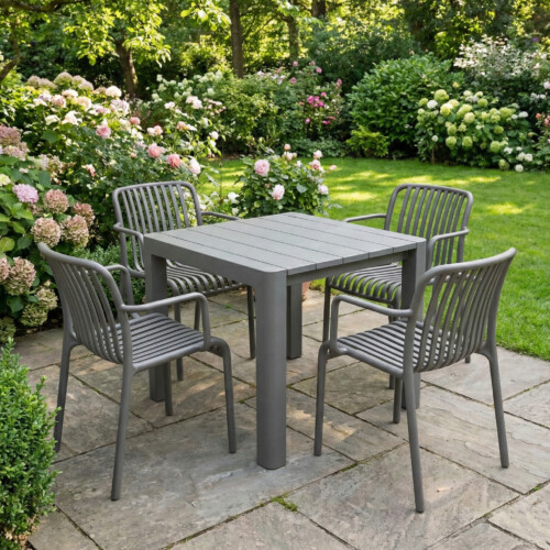 Henrik 100 Dining Table Nickel Grey With 4 Alma Armchair Nickel Grey Set picture 01 a garden lifestyle image