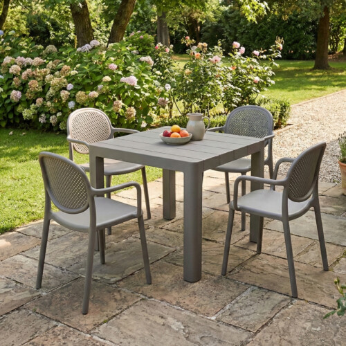 Henrik 100 Dining Table Nickel Grey With 4 Stina Armchair Nickel Grey Set picture 01 a garden lifestyle image