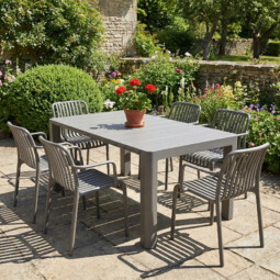 Henrik 140 Dining Table Nickel Grey With 6 Alma Armchair Nickel Grey Set picture 01 a garden lifestyle image