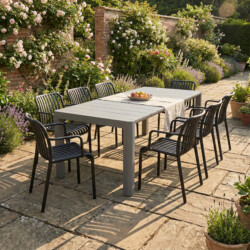 Henrik 220 Dining Table Nickel Grey With 8 Alma Armchair Black Set picture 01 a garden lifestyle image